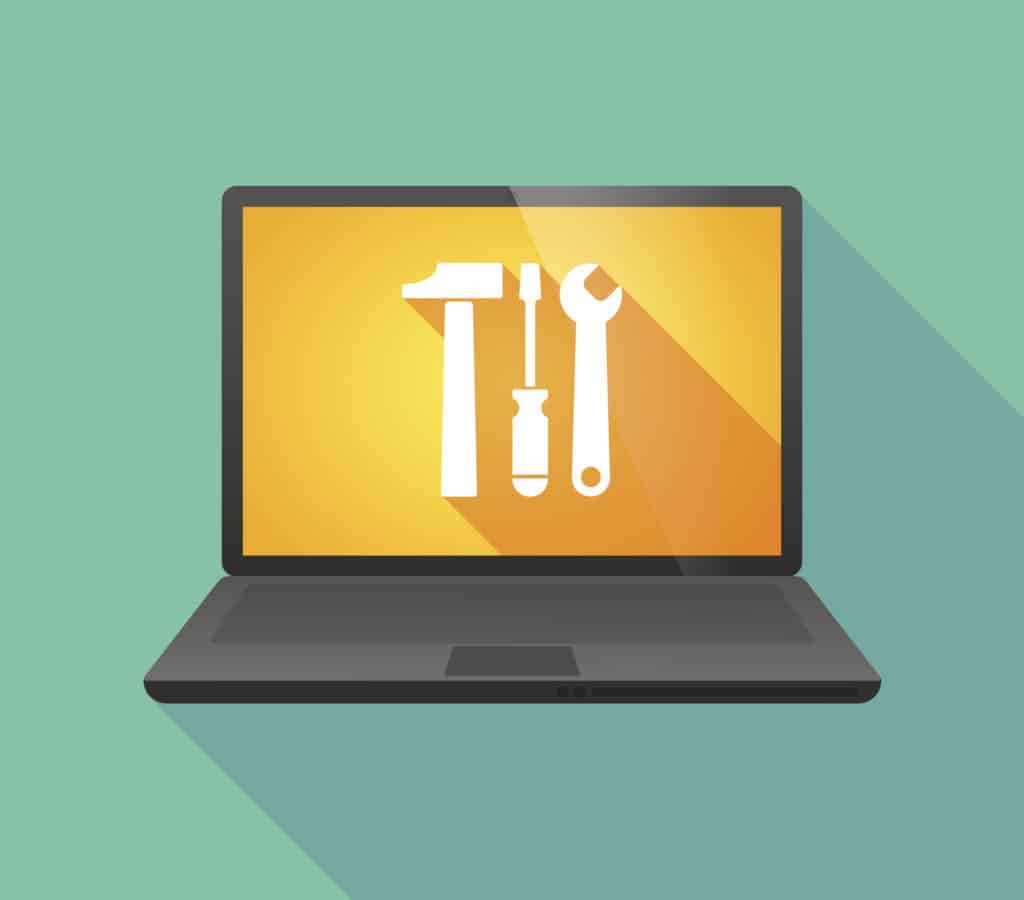 Laptop icon with a tool set