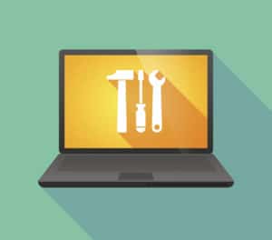 Laptop icon with a tool set